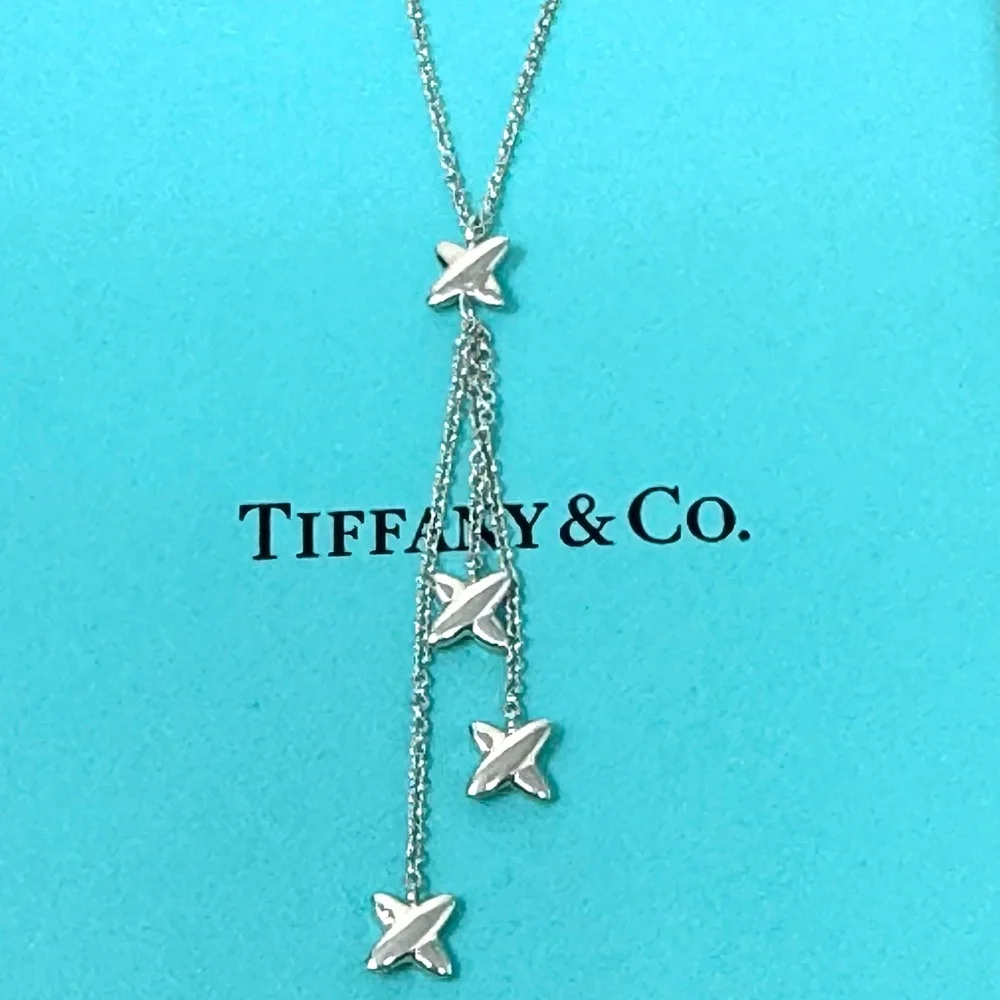 Authentic Tiffany & co. Triple X Kiss Cross Drope Necklace.